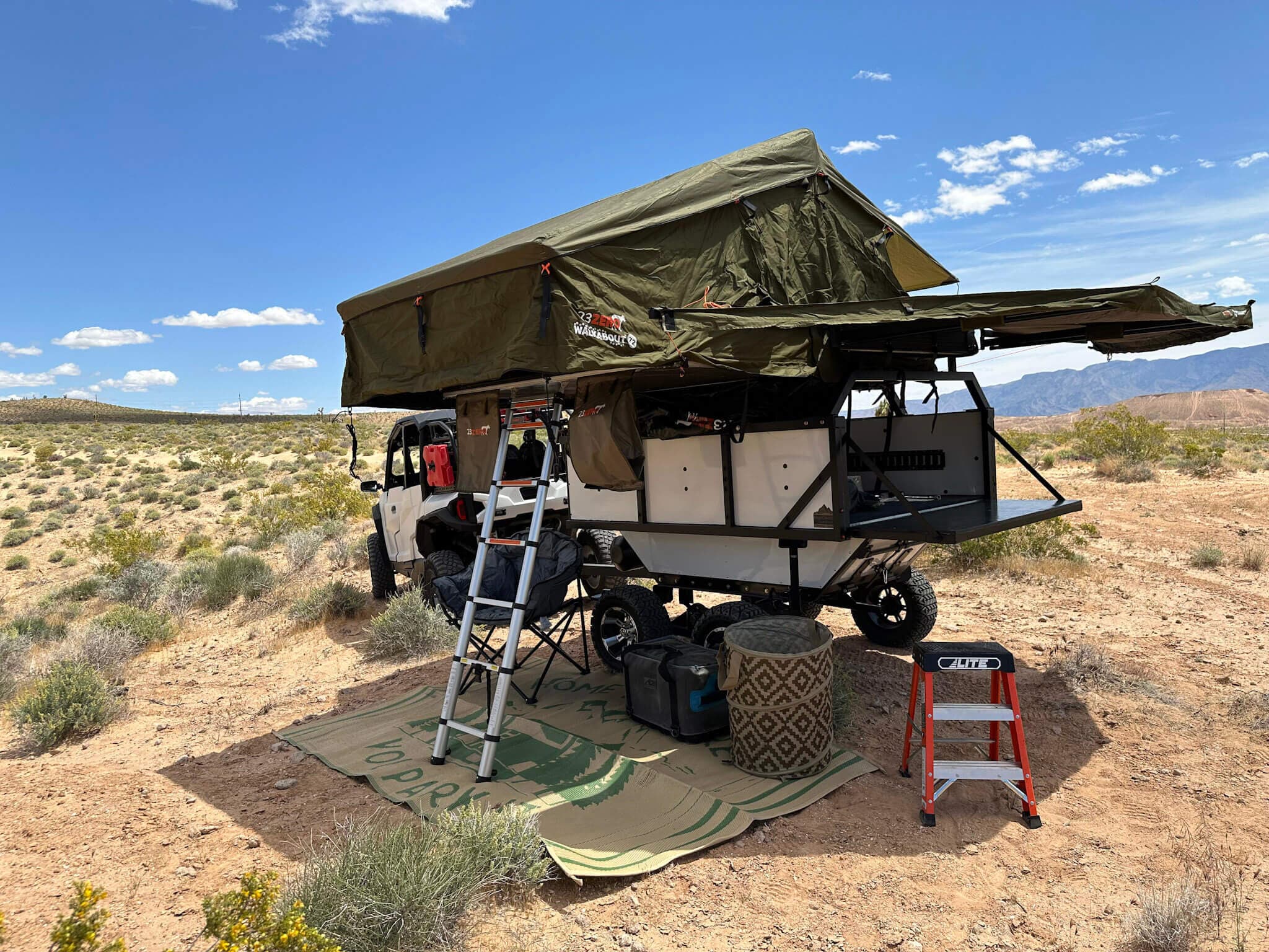 Mansion Rover trailer with 23Zero soft-shell rooftop tent and ladder